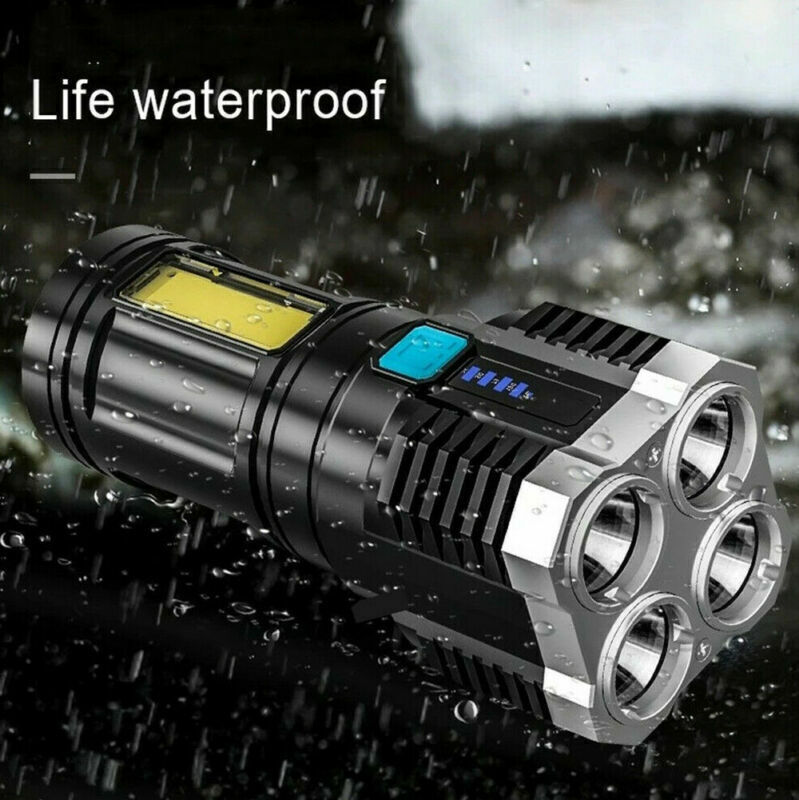 Waterproof flashlight with raindrops on a dark background