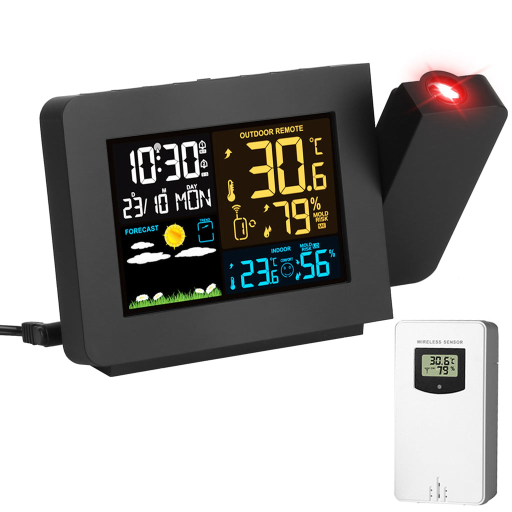 Digital clock with weather station display and remote sensor on a white background