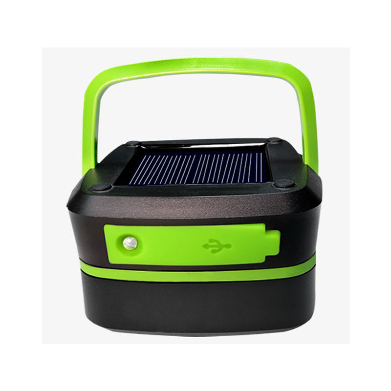 Black and green solar lantern on a white background