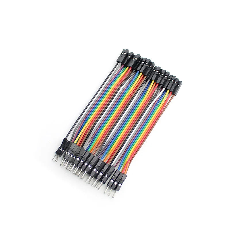 A set of 16-pin breadboard jumper wires with black plastic connectors and multicolored ribbon cables on a plain white background.