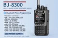 BAJETON BJ-8300 multi-band NOAA weather radio shown on a light blue background with product specs and Bluetooth phone programming text. The handheld device is black and gray with a digital display and keypad.