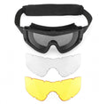 Black sports goggles with a padded head strap, shown with two interchangeable replacement lenses in clear and yellow.