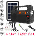 Solar light set with solar panel, radio, and multiple cables on a white background