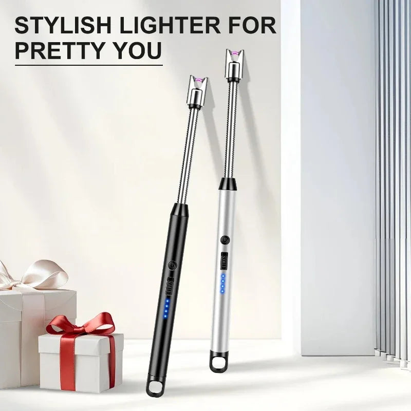 Two slim electric cat-shaped desk lamps shown upright on a clean white surface, one black and one silver, with decorative gift boxes at the lower left and the text 'STYLISTIC LIGHTER FOR PRETTY YOU' at the upper left.