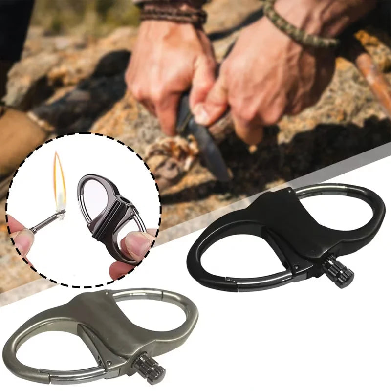 A carabiner-style fire starter lighter shown in two finishes, one black and one silver-gray, on a white background with a circular inset demonstrating the lighter in use to ignite a flame. A blurred outdoor scene with hands appears in the background.
