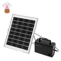 A solar power system featuring a tilted rectangular solar panel with a white frame connected to a black portable power station, shown on a plain white background with a small decorative pot logo in the top-left corner.