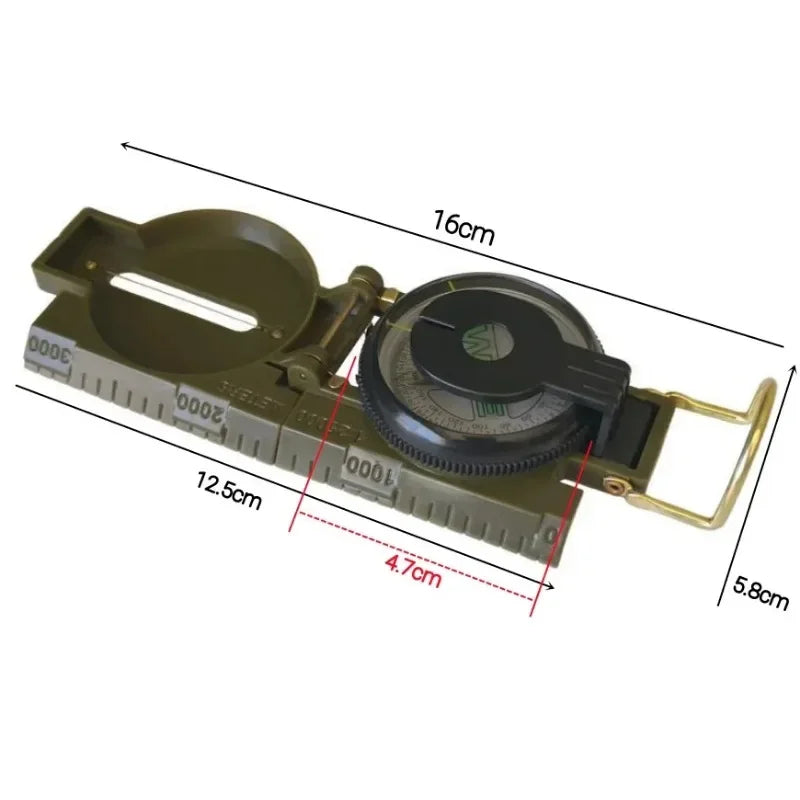 A military-style compass with a built-in ruler and measurement markings, shown on a white background with overlaid dimension lines and labels indicating 16cm, 12.5cm, 4.