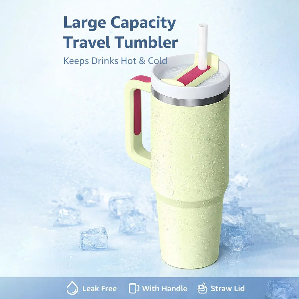 Large capacity travel tumbler with handle and straw lid on a light blue background