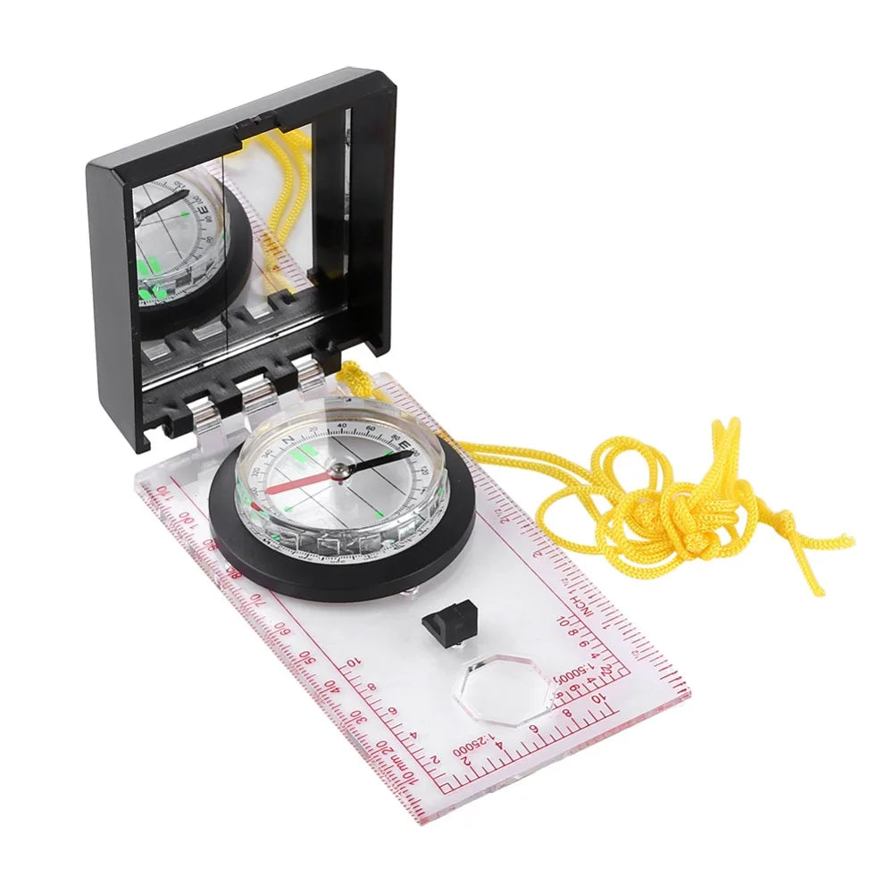 Compass with a yellow string on a white background