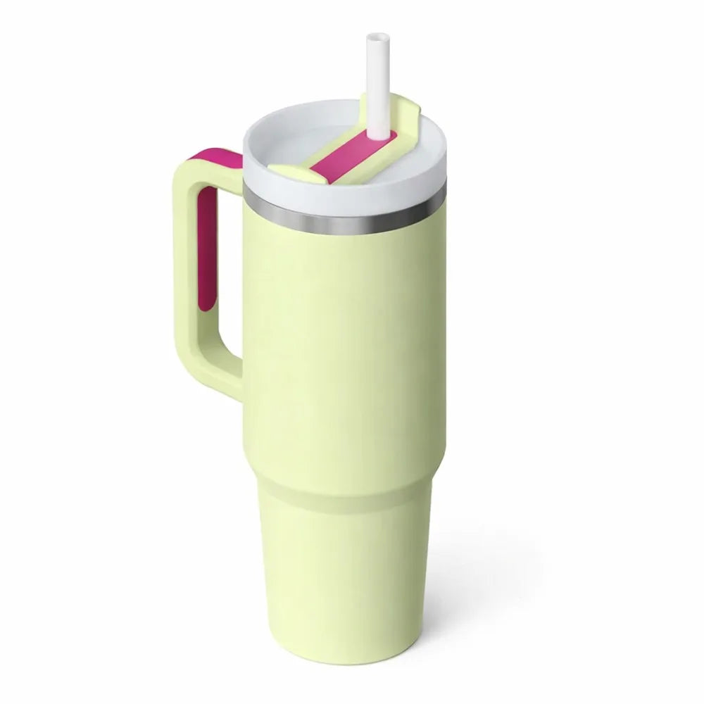 Light green tumbler with a pink handle and straw on a white background