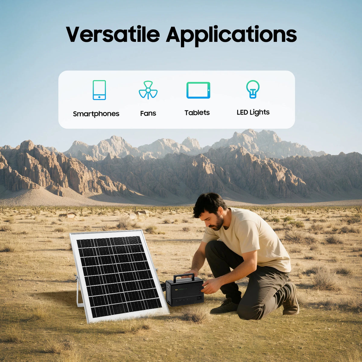 A man in a desert landscape connects a portable power station to a solar panel. The scene includes an overlay graphic at the top reading 'Versatile Applications' with icons for Smartphones, Fans, Tablets, and LED Lights.