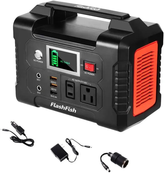 Black and red portable power station with multiple outlets and cables on a white background