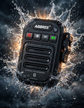 A black Abbree Bluetooth pet waterproof walkie-talkie is shown in a dramatic splash of water and rain, with the brand name 'ABBREE' clearly visible on the front.